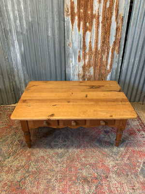 A large pine coffee table