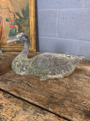 A pair of garden duck figures