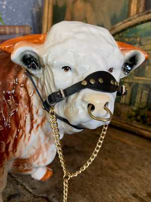 A large ceramic Hereford bull by Nelson Pottery