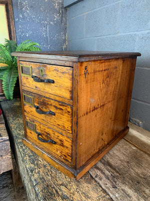 A bank of drawers by F. Coote- monogrammed for King George V & King Edward VII