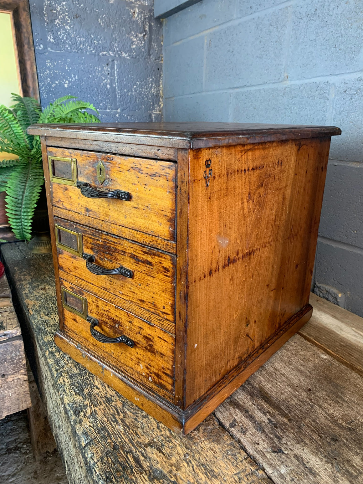 A bank of drawers by F. Coote- monogrammed for King George V & King Edward VII