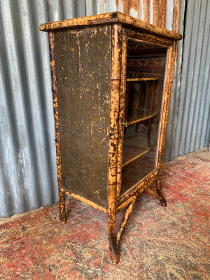 A tiger bamboo display cabinet