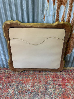 A large giltwood wall mirror