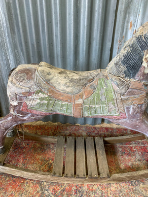 Carved wooden rocking horse