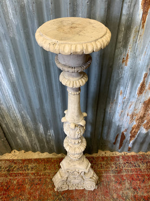 A large stone effect pricket candlestick