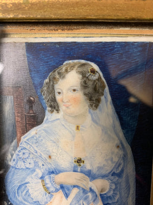 A framed miniature of a woman in blue ~ front view