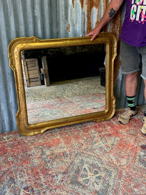A large giltwood wall mirror