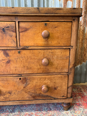 A pine chest of two over two drawers