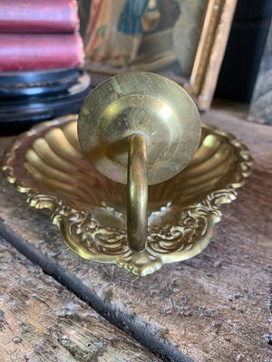 A pair of large brass shell candlestick wall sconces