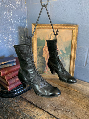 A pair of hanging Victorian boots ~ brothel trade sign
