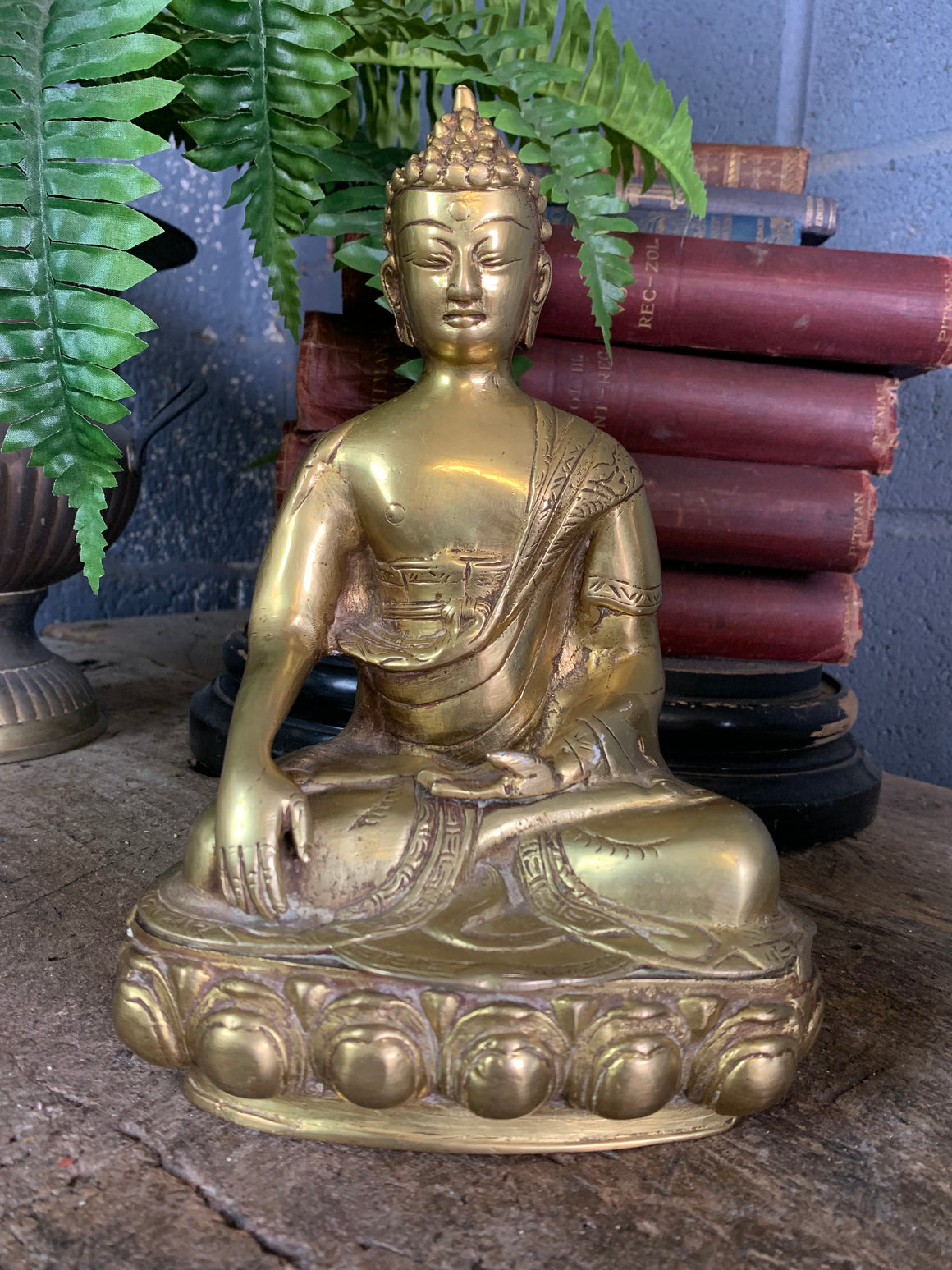 A bronze seated Buddha figure