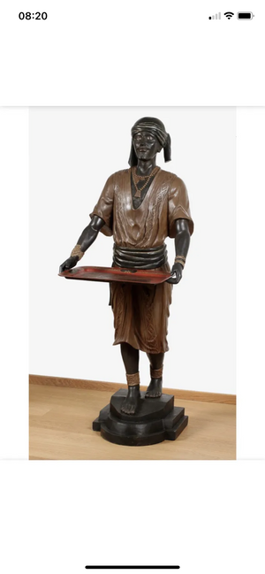 A full size Blackamoor figure with tray