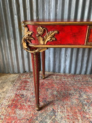 A red lacquer continental table