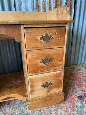 A pine clerk's desk with galleried top