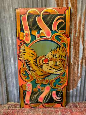 A hand-painted fairground panel depicting a tiger
