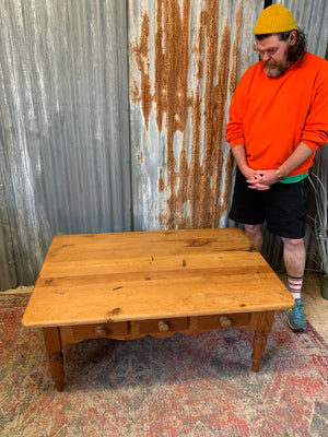 A large pine coffee table