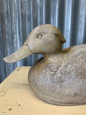 A wooden duck decoy