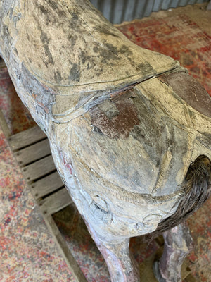 Carved wooden rocking horse