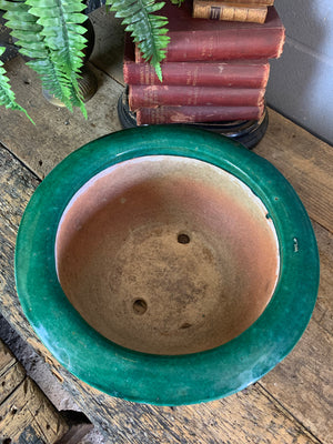 A large Chinese green glaze clay jardiniere