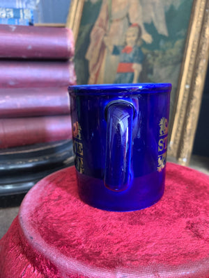 A cobalt blue ‘Strychnine’ apothecary mug