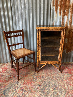 A tiger bamboo display cabinet