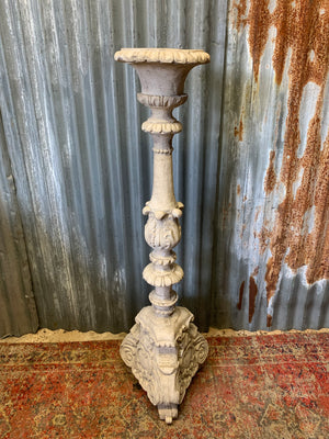 A large stone effect pricket candlestick