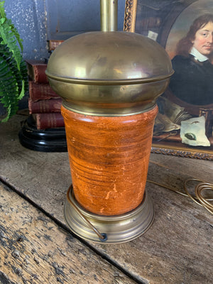 A converted tobacco jar lamp