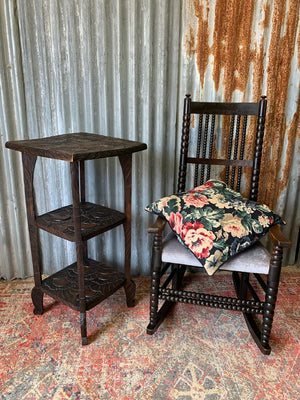 A Japanese carved three tier side table for Liberty London