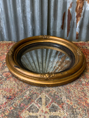 A large Regency giltwood convex mirror