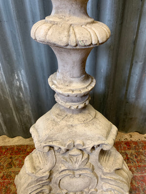A large stone effect pricket candlestick