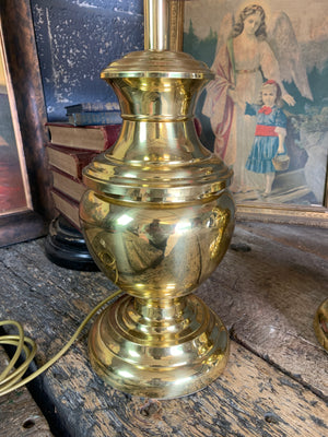 A pair of baluster form brass lamps