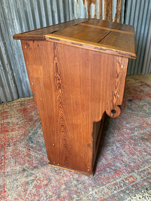 A pine double lectern standing desk