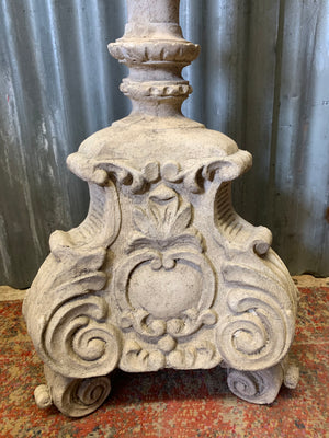 A large stone effect pricket candlestick