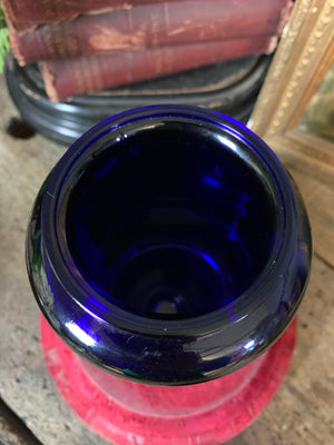 A blue glass myrrh apothecary jar by the Royal Pharmaceutical Society