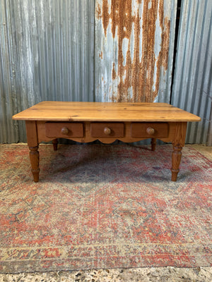A large pine coffee table