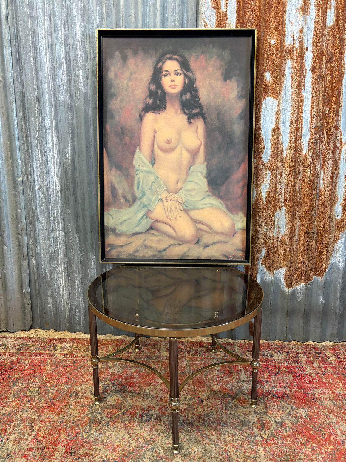 A large framed print of a nude female by Larry Vincent Garrison