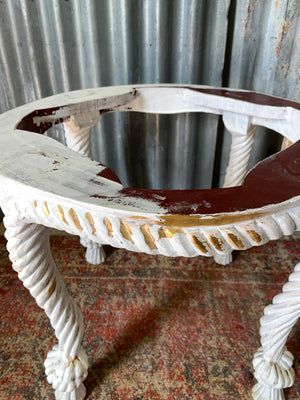 An Italian giltwood and marble rope tassel table