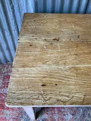 A pine kitchen table by Staines of Westminster