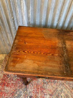 An oak two drawer table