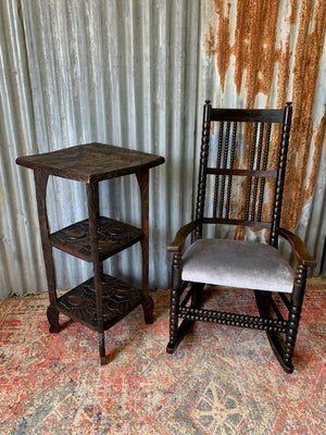 A Japanese carved three tier side table for Liberty London