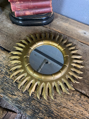 A Spanish giltwood sunburst mirror