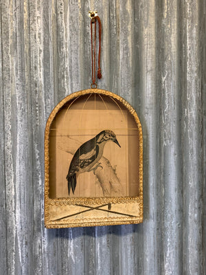 A 19th Century trompe l'oeil framed bird cage picture