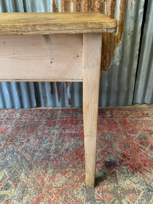 A pine kitchen table by Staines of Westminster