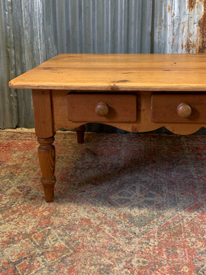 A large pine coffee table