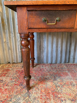 An oak two drawer table