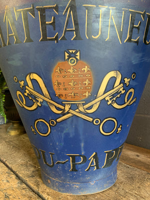 A large metal grape hod