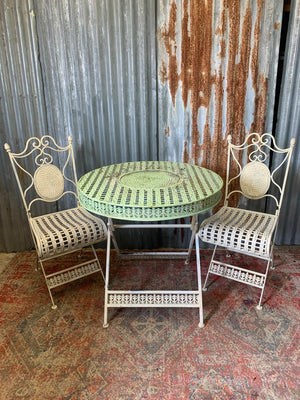 A lattice design garden table and chairs set