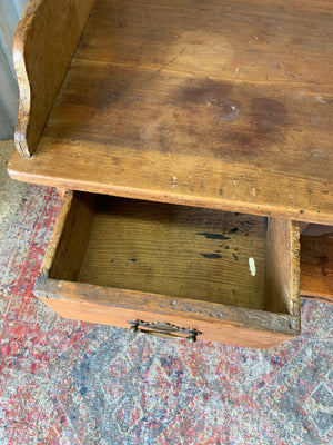 A pine clerk's desk with galleried top