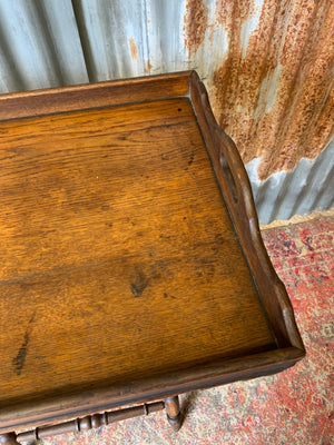 An oak butler's tray table