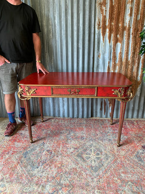 A red lacquer continental table